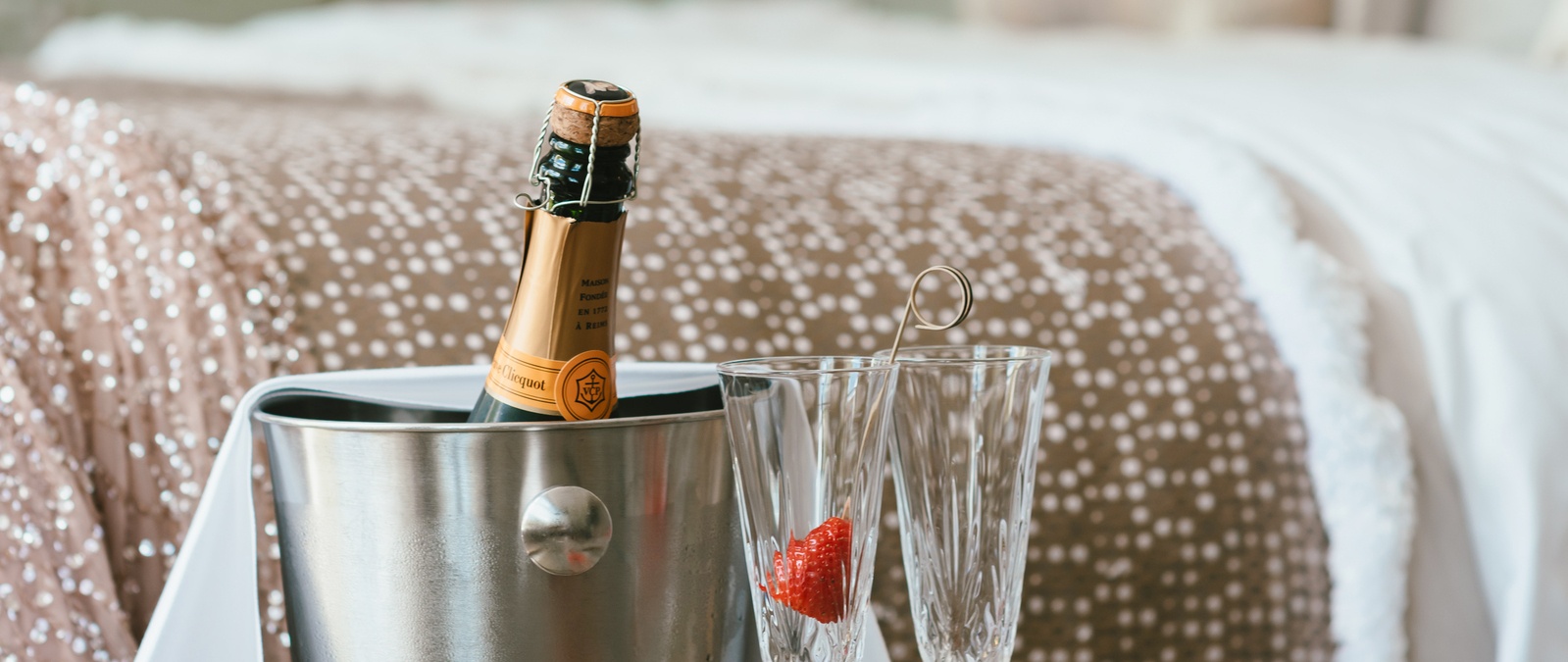 Fresh flowers and champagne in a canal view room at Hotel Estheréa