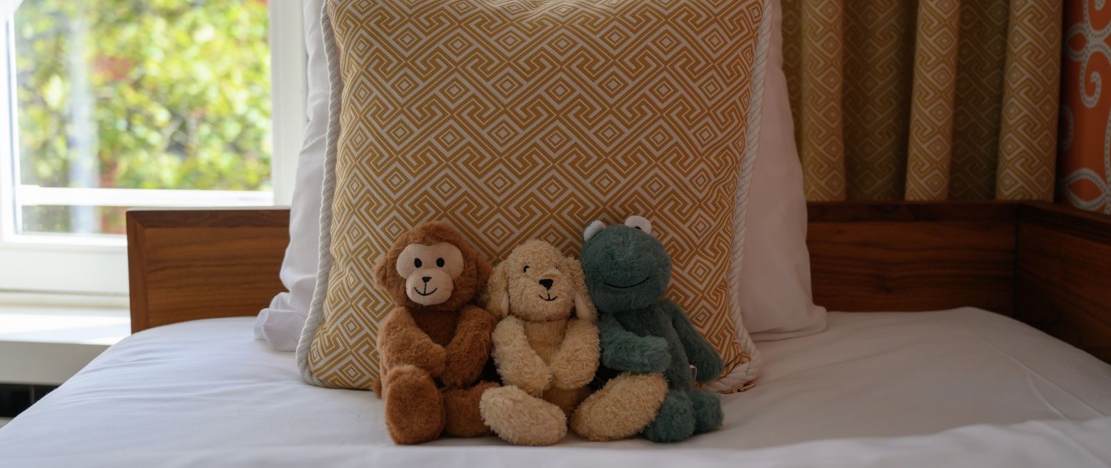 Children stuffed animals as room extras at Hotel Estheréa 